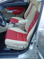 Highlight for Album: Honda Civic 5-deurs 2006
Lederen bekleding beige met rood en contrasterende stiknaden