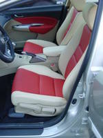 Highlight for Album: Honda Civic 5-deurs 2006
Lederen bekleding beige met rood en contrasterende stiknaden